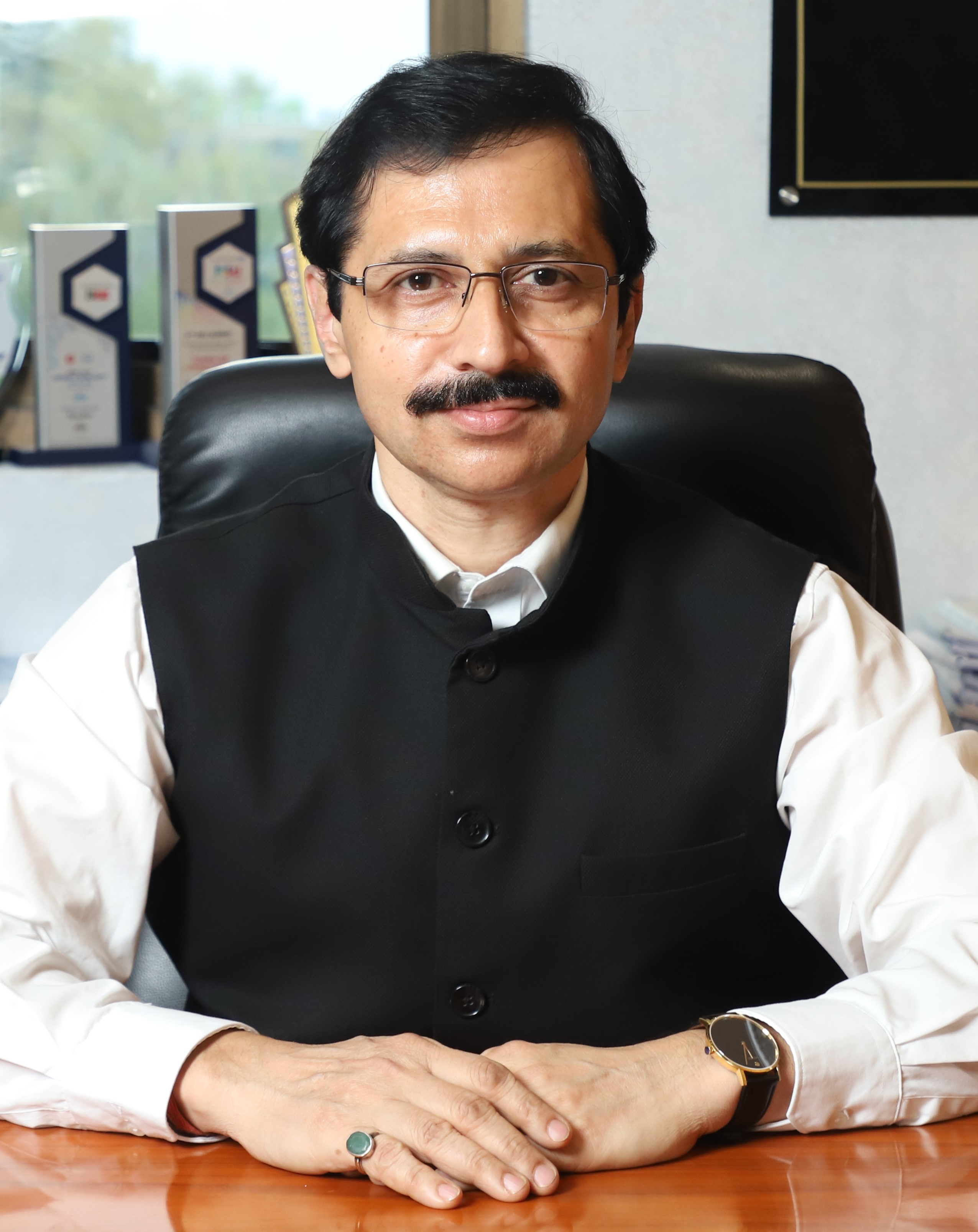 Sh. Manoj Tandon (DPOM)